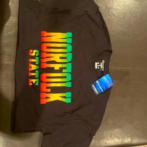 A brand new shirt that had never been worn with tags still on.